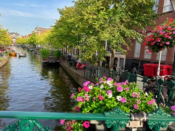 Beautiful view of city street with buildings and water canal