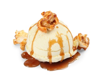 Photo of Delicious ice cream with caramel popcorn and sauce on white background