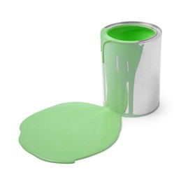 Photo of Spilled light green paint and can on white background