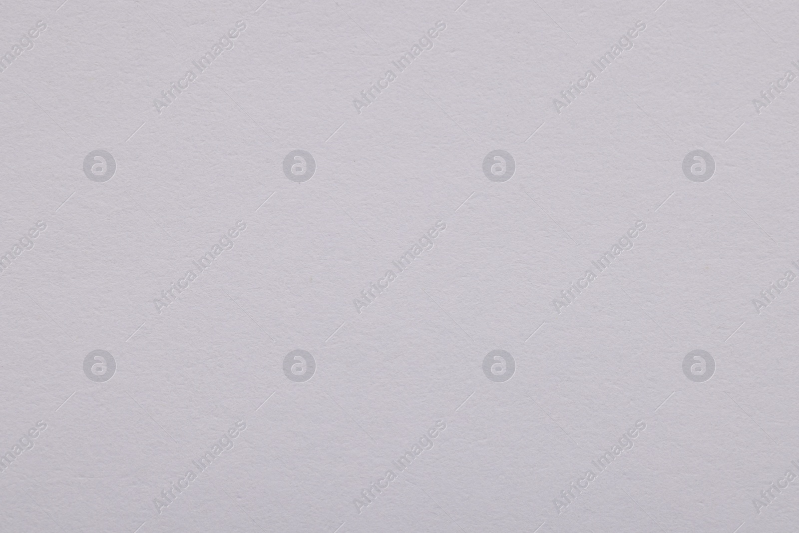 Photo of Texture of light grey paper sheet as background, top view