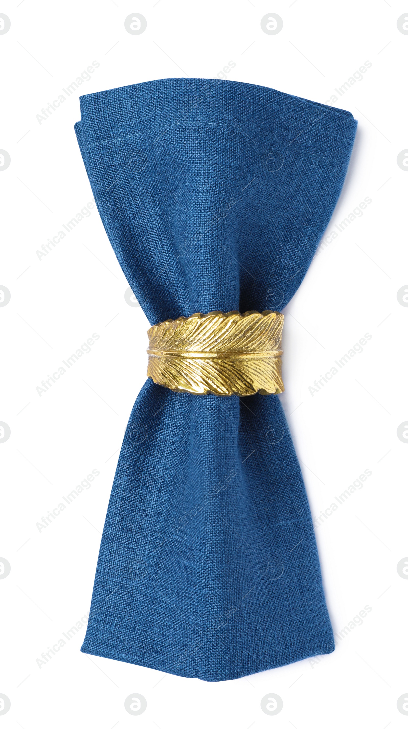 Photo of Blue fabric napkin with decorative ring for table setting on white background, top view