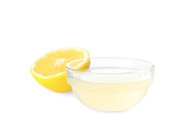 Photo of Freshly squeezed lemon juice on white background