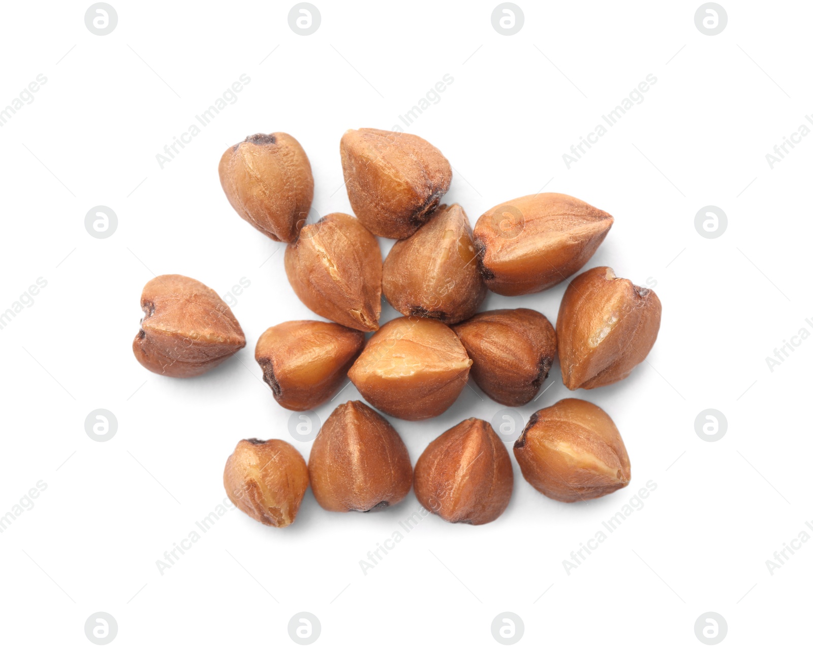 Photo of Buckwheat grains isolated on white, top view. Organic cereal