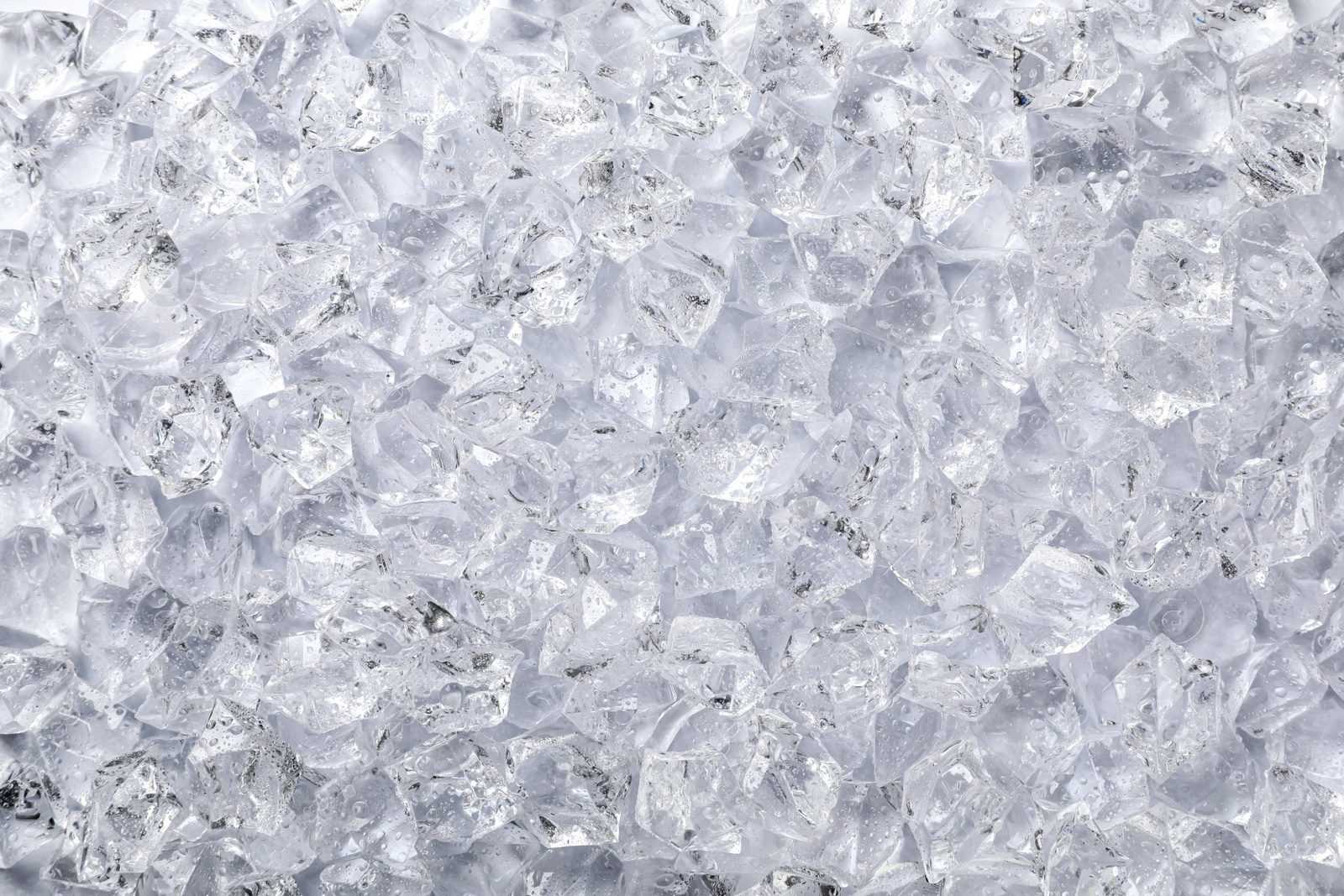 Photo of Clear crushed ice as background, top view