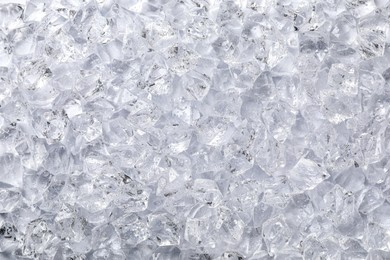 Photo of Clear crushed ice as background, top view