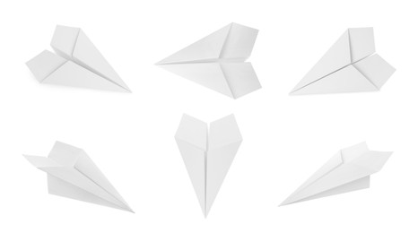 Image of Set with handmade paper planes on white background. Banner design