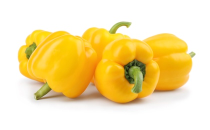 Ripe yellow bell peppers isolated on white