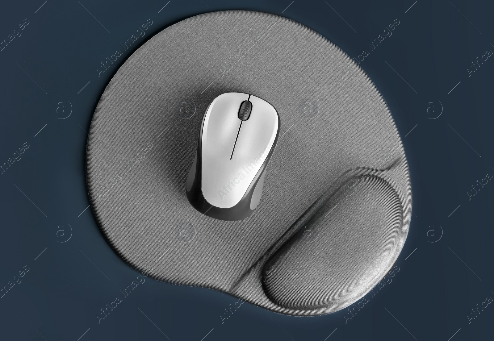 Photo of Blank pad and wireless computer mouse on grey background, top view