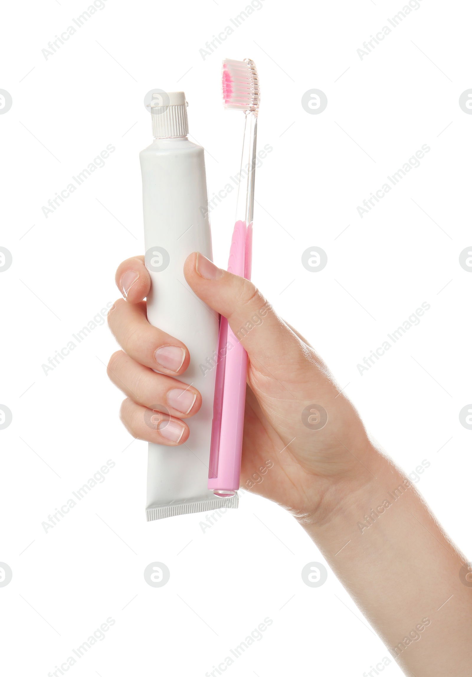 Photo of Woman holding toothbrush and paste against white background. Dental care