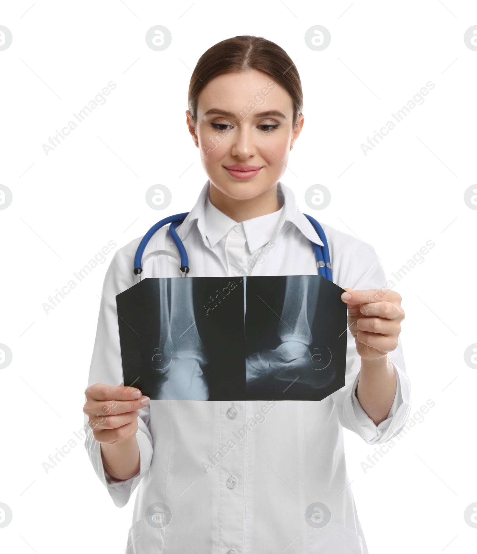 Photo of Orthopedist holding X-ray picture on white background