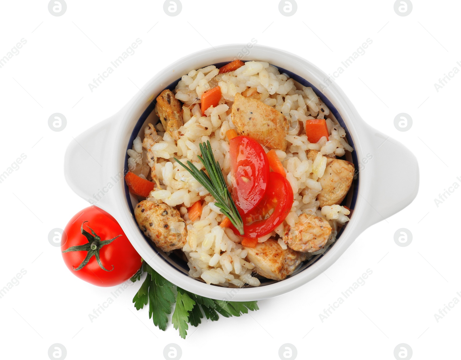 Photo of Delicious chicken risotto and fresh tomato with parsley isolated on white, top view