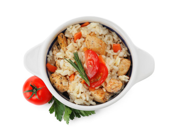 Photo of Delicious chicken risotto and fresh tomato with parsley isolated on white, top view
