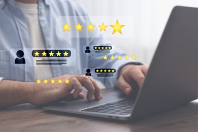 Man leaving service feedback using laptop at table, closeup. Reviews and stars near device