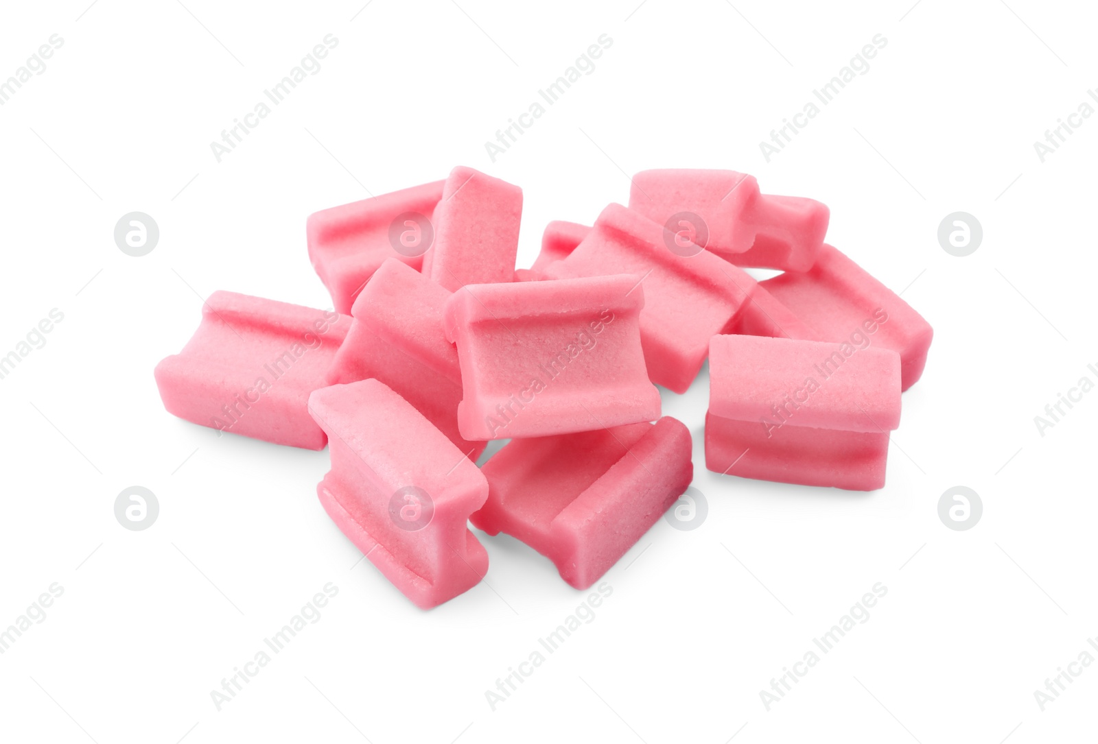 Photo of Pile of tasty pink chewing gums on white background