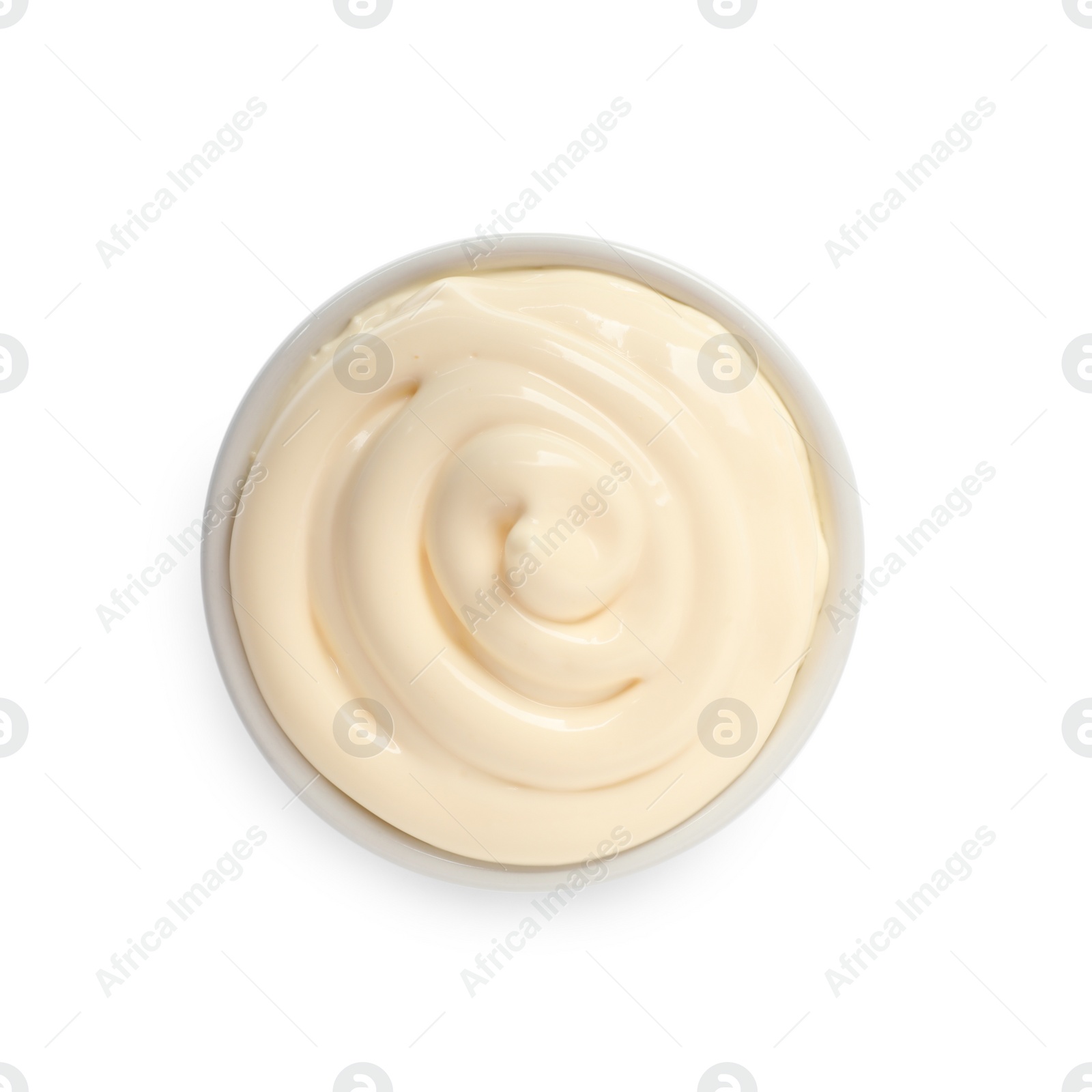 Photo of Bowl with tasty mayonnaise isolated on white, top view