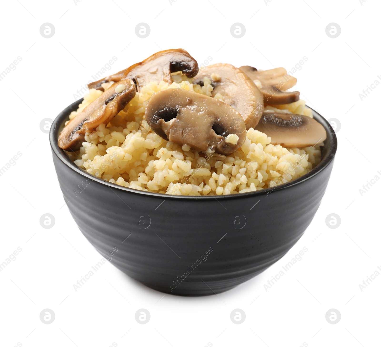 Photo of Delicious bulgur with mushrooms in bowl isolated on white