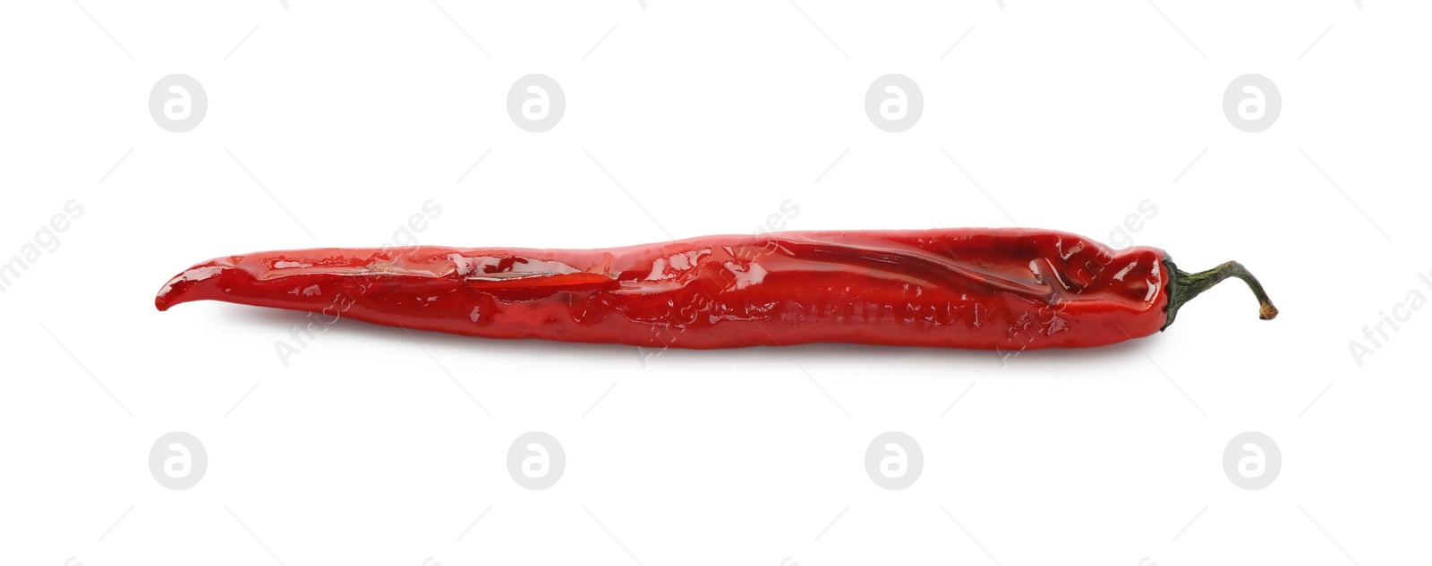 Photo of Grilled red chili pepper isolated on white