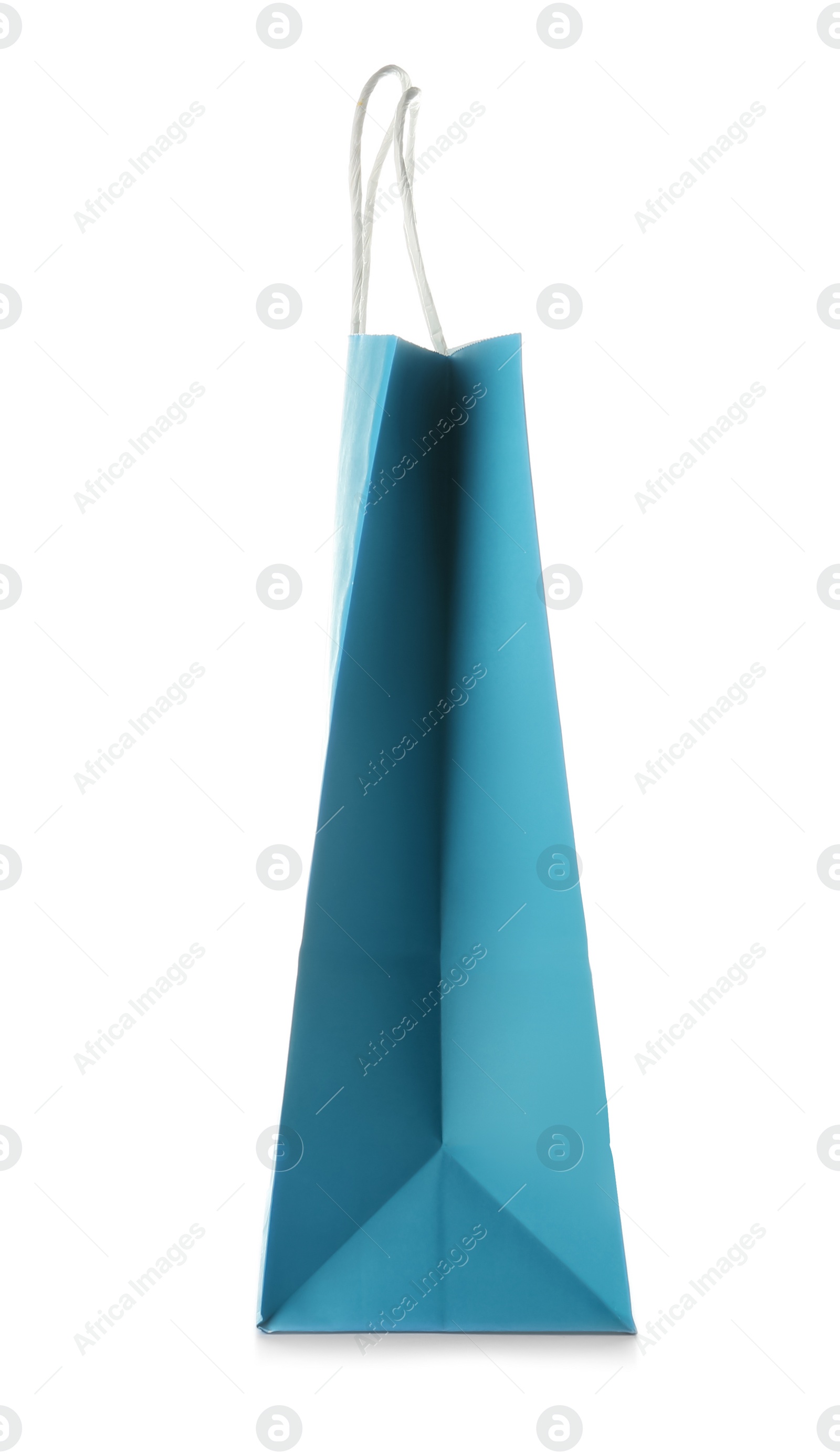 Photo of Empty paper shopping bag on white background