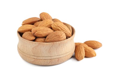 Photo of Wooden bowl and organic almond nuts on white background. Healthy snack