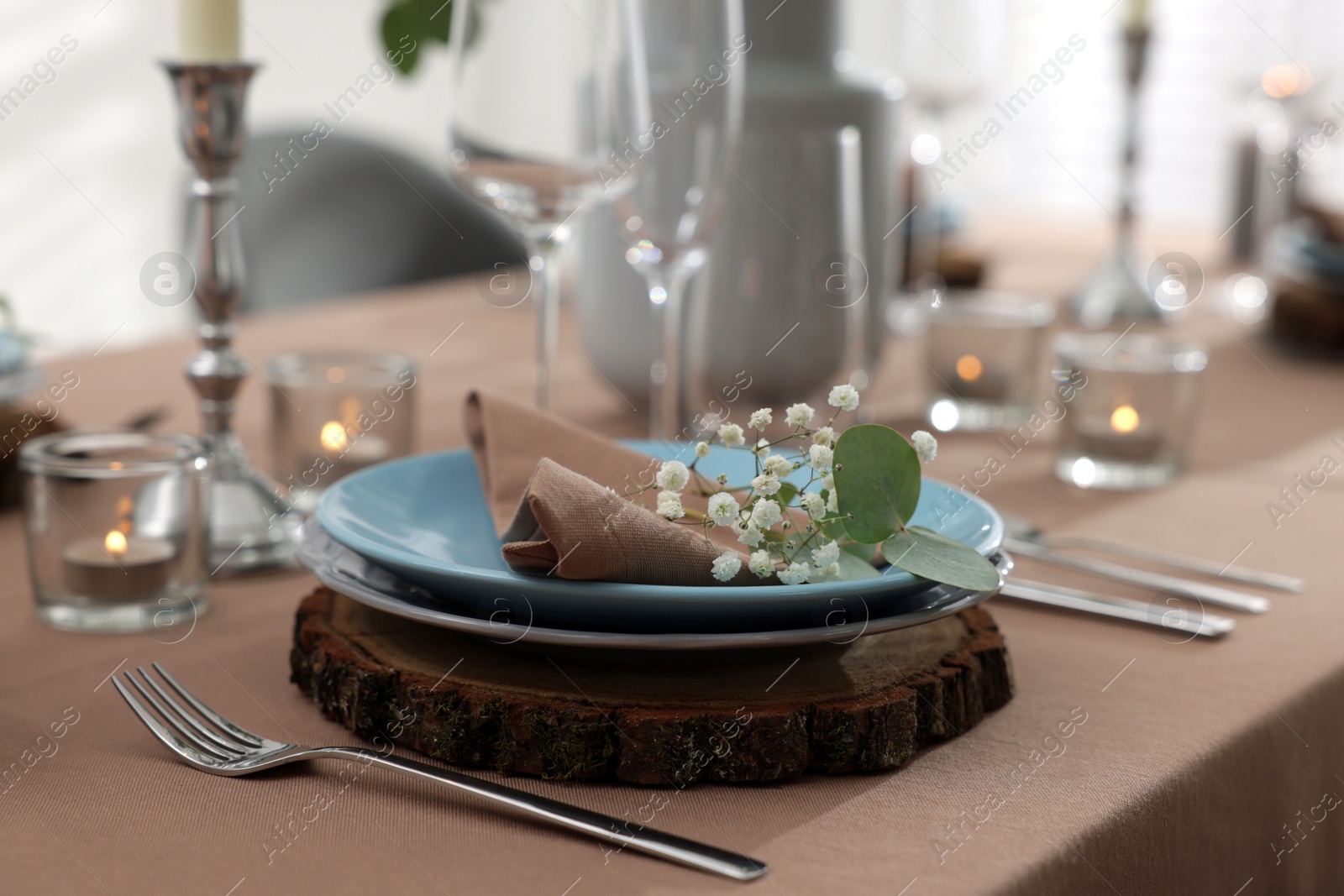 Photo of Festive table setting with beautiful tableware and decor