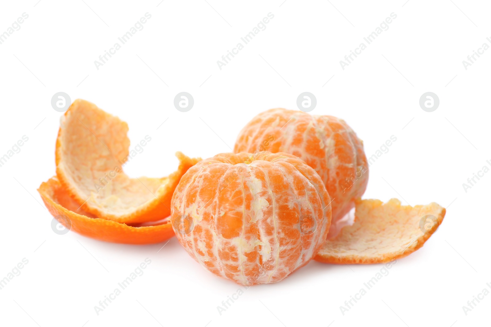 Photo of Peeled fresh tangerines on white background. Citrus fruit