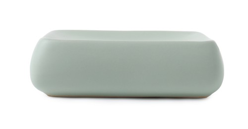 Photo of Bath accessory. Light green ceramic soap dish isolated on white