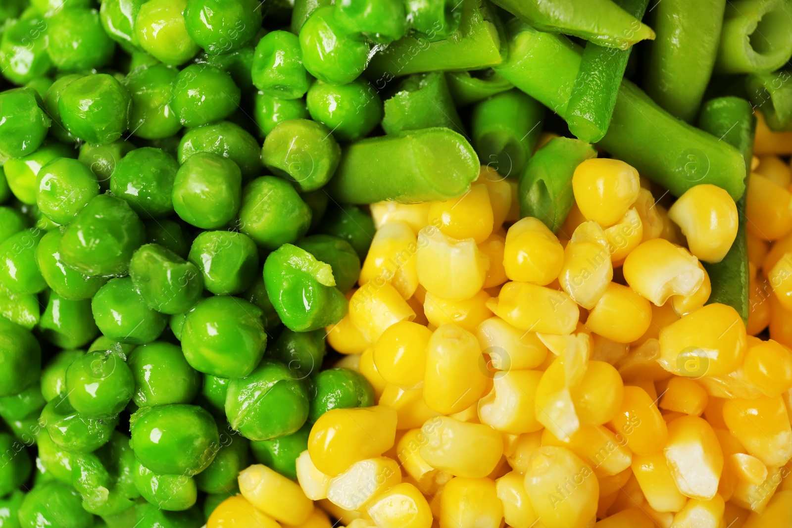 Photo of Mix of frozen vegetables as background, top view