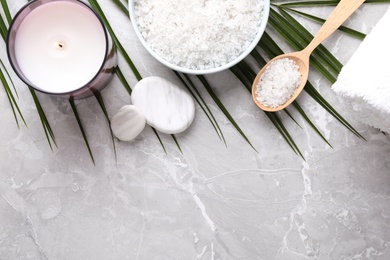 Photo of Flat lay composition with white sea salt on marble background, space for text. Spa treatment