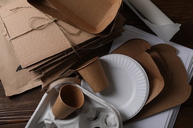 Photo of Heap of waste paper on table, top view