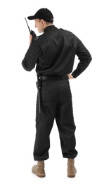 Male security guard using portable radio transmitter on white background