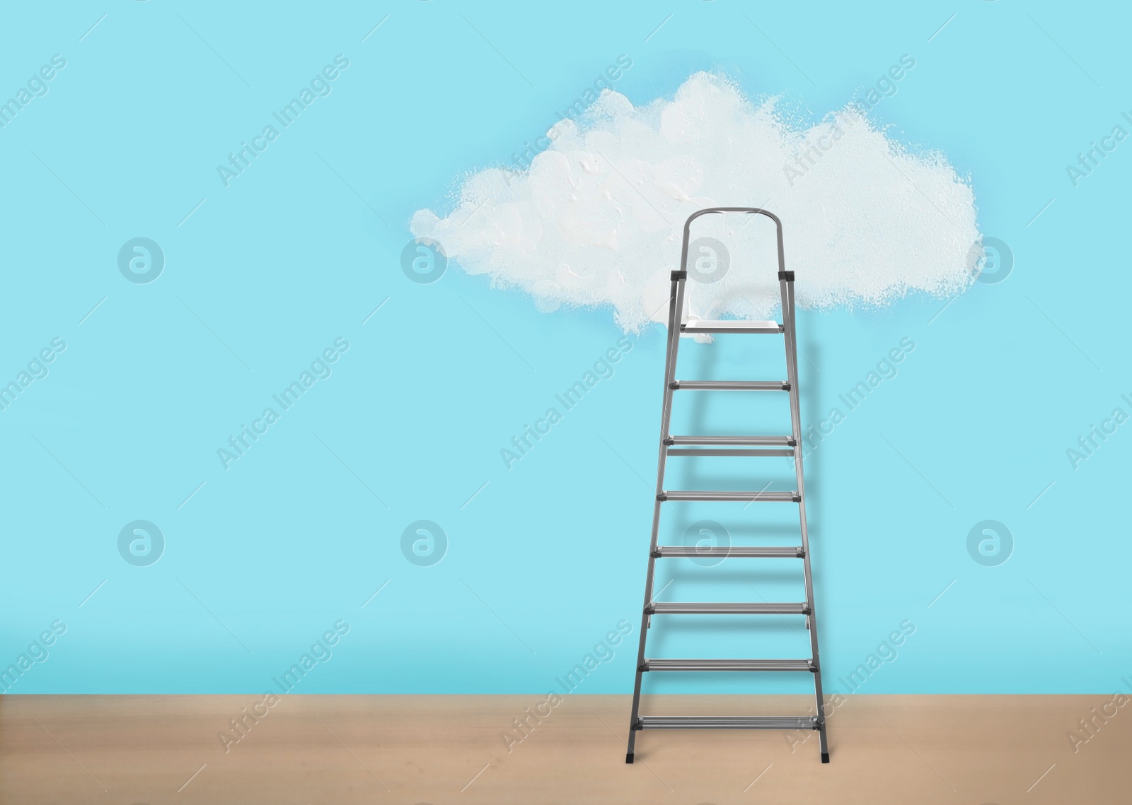 Image of Metal stepladder near light blue wall with painted cloud. Conceptual design 