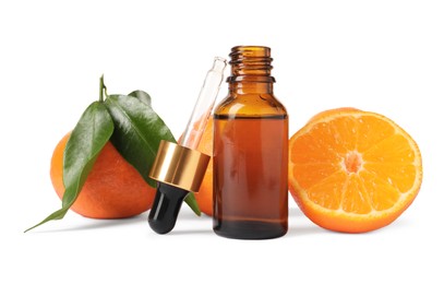 Aromatic tangerine essential oil in bottle, pipette and citrus fruits isolated on white