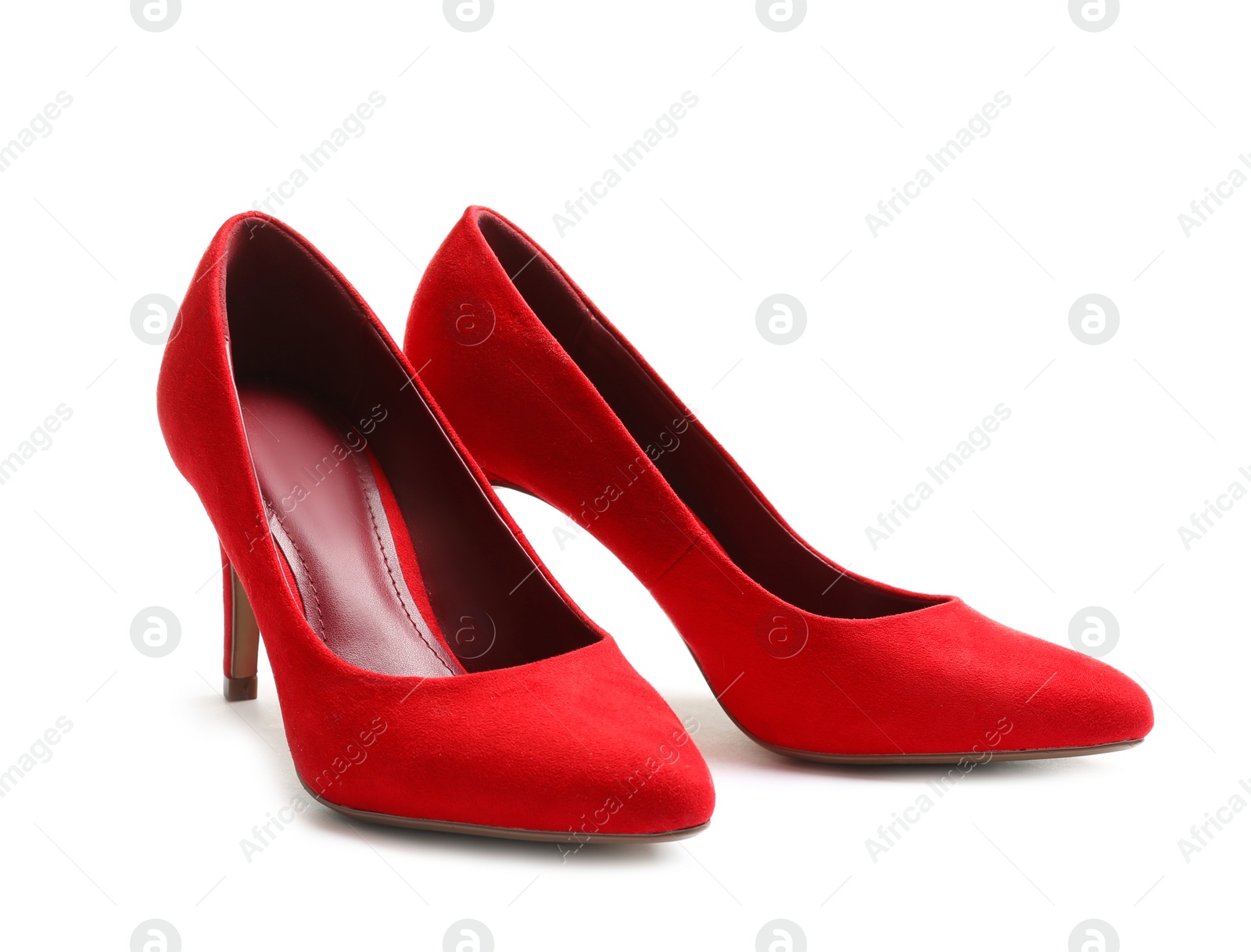 Photo of Stylish high heel shoes on white background