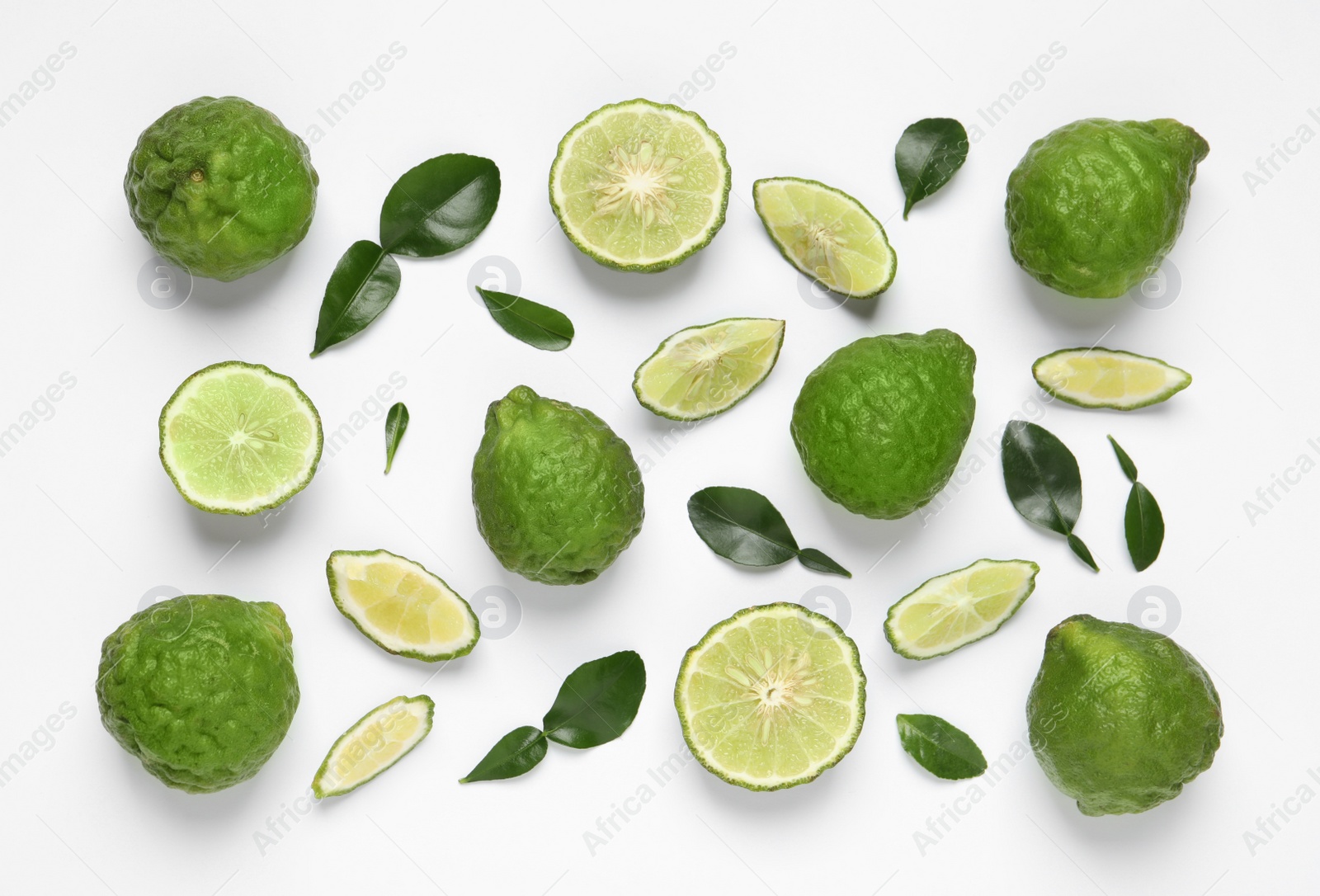 Photo of Flat lay composition with ripe bergamot fruits on white background