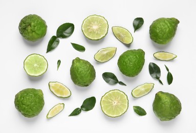 Flat lay composition with ripe bergamot fruits on white background