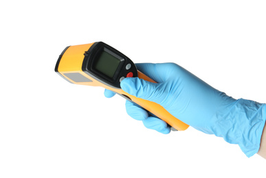 Doctor in latex gloves holding non-contact infrared thermometer on white background, closeup