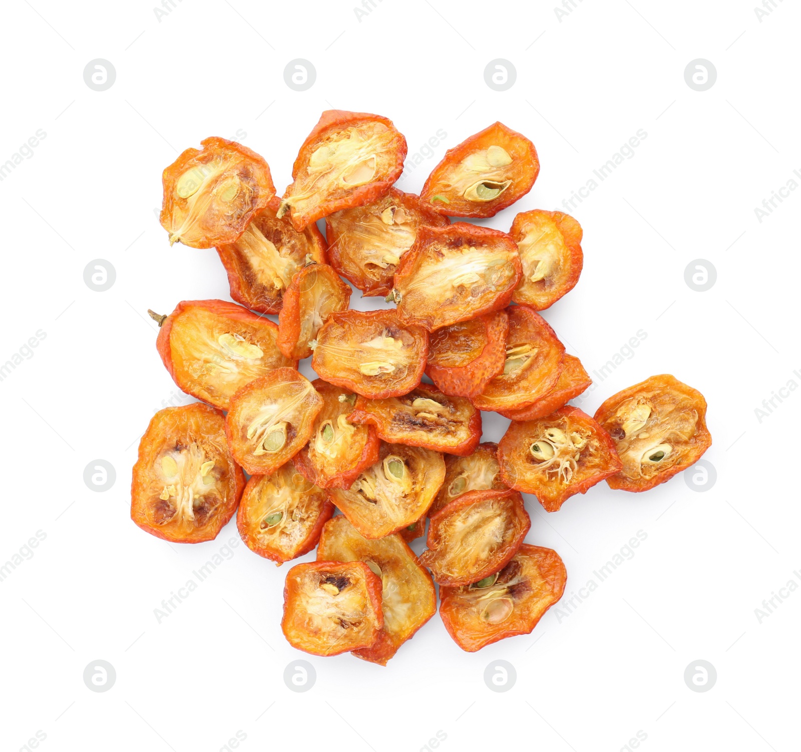 Photo of Heap of cut dried kumquat fruits isolated on white, top view