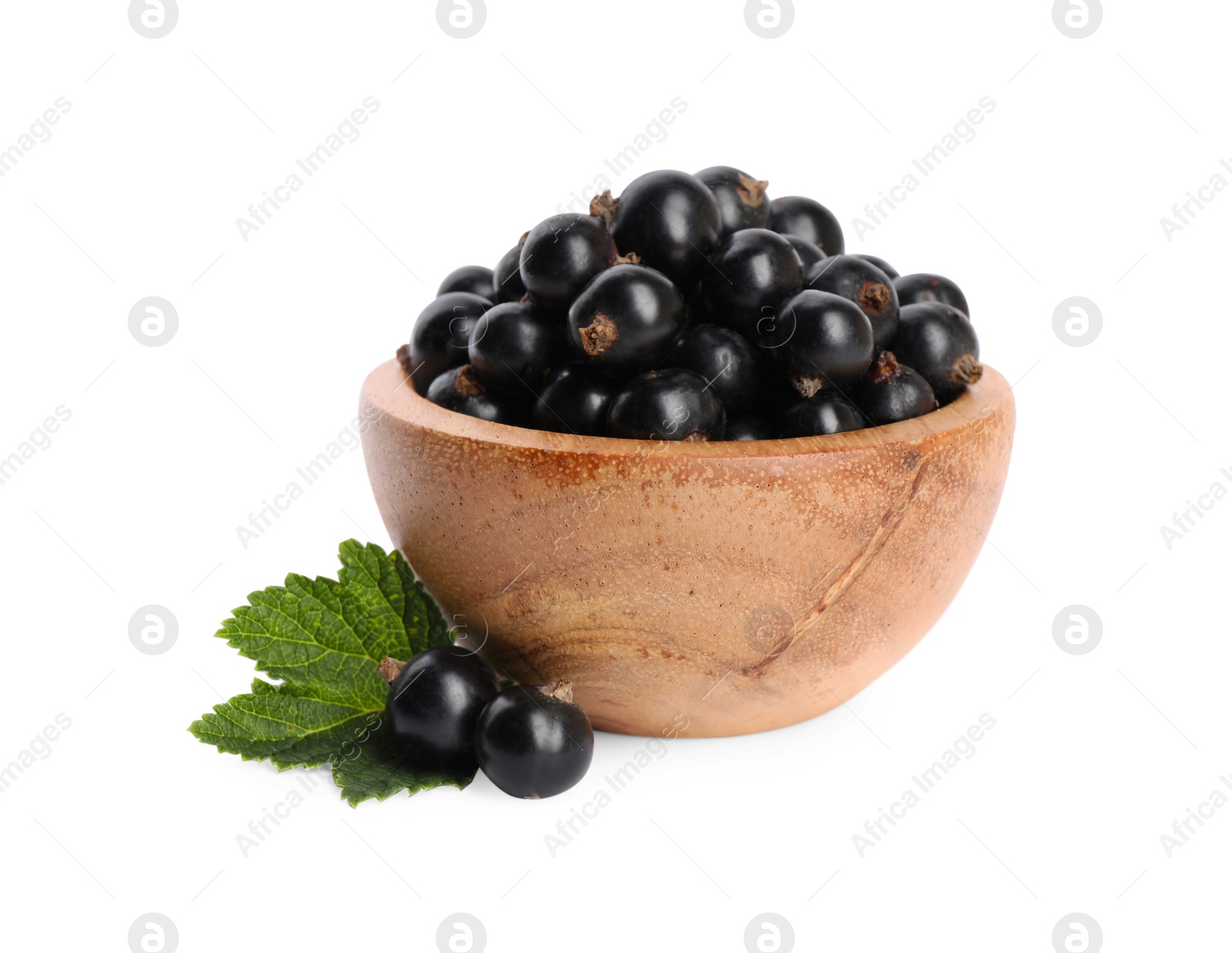 Photo of Ripe blackcurrants and leaf isolated on white