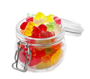 Glass jar with delicious jelly bears on white background