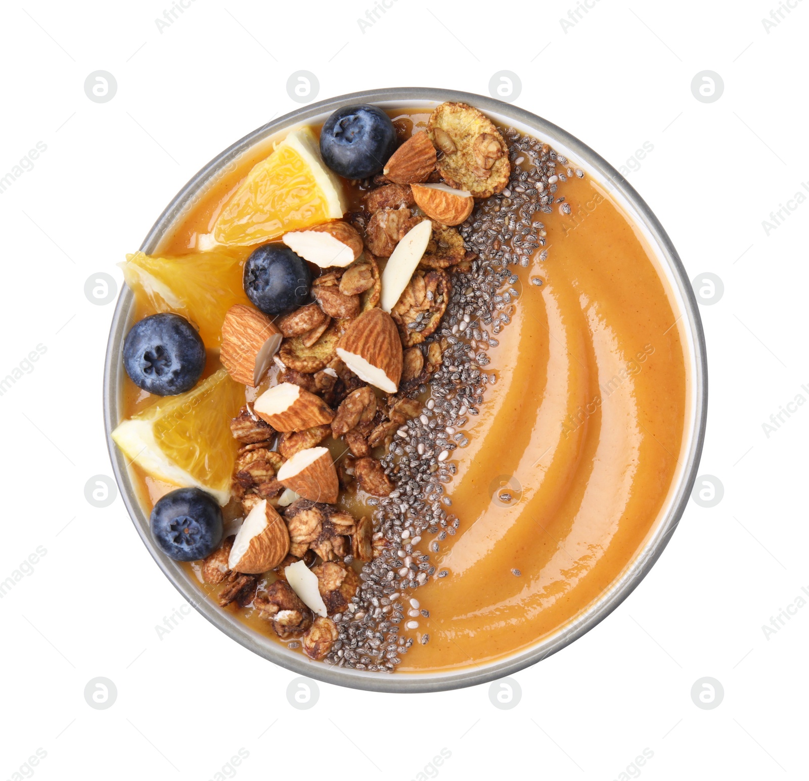 Photo of Bowl of delicious fruit smoothie with fresh orange slices, blueberries and granola isolated on white, top view