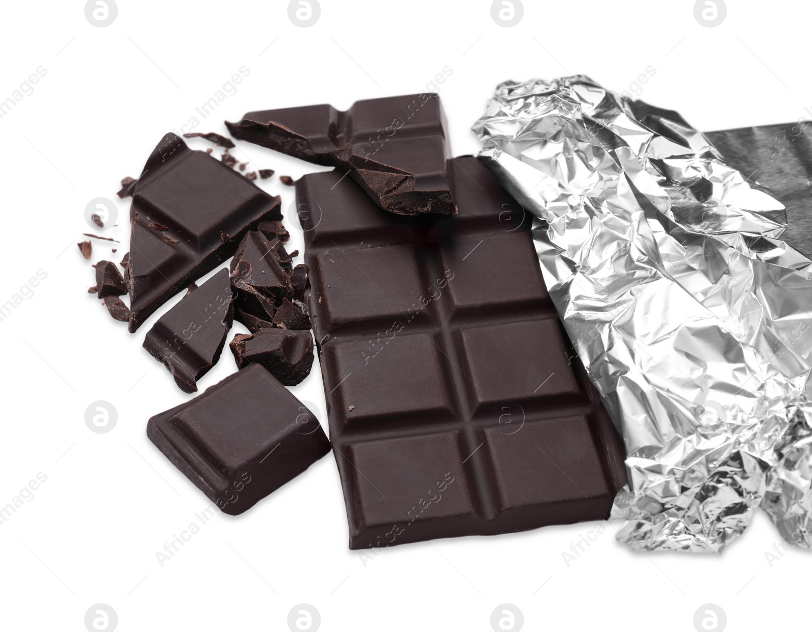 Photo of Pieces of delicious dark chocolate bar on white background