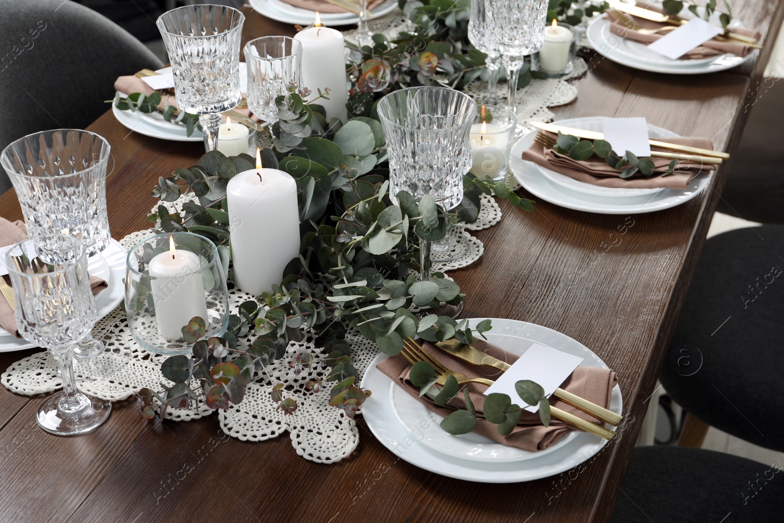 Photo of Luxury table setting with beautiful decor and blank cards. Festive dinner