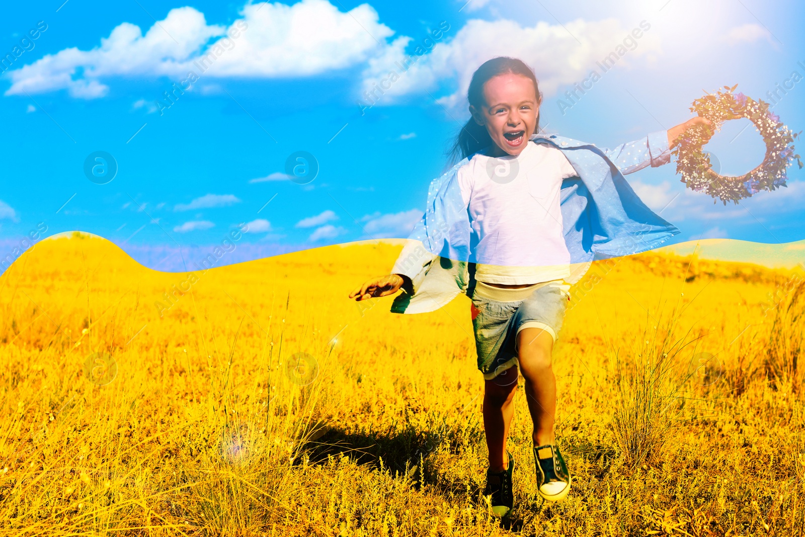 Image of Double exposure of cute little girl with flower wreath running in field and Ukrainian flag 