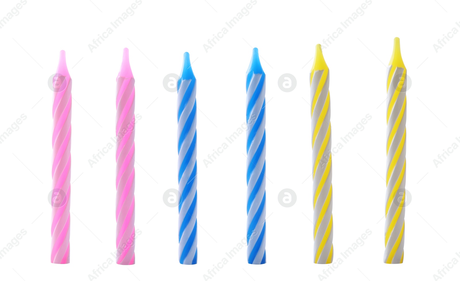 Photo of Set of colorful striped birthday candles isolated on white