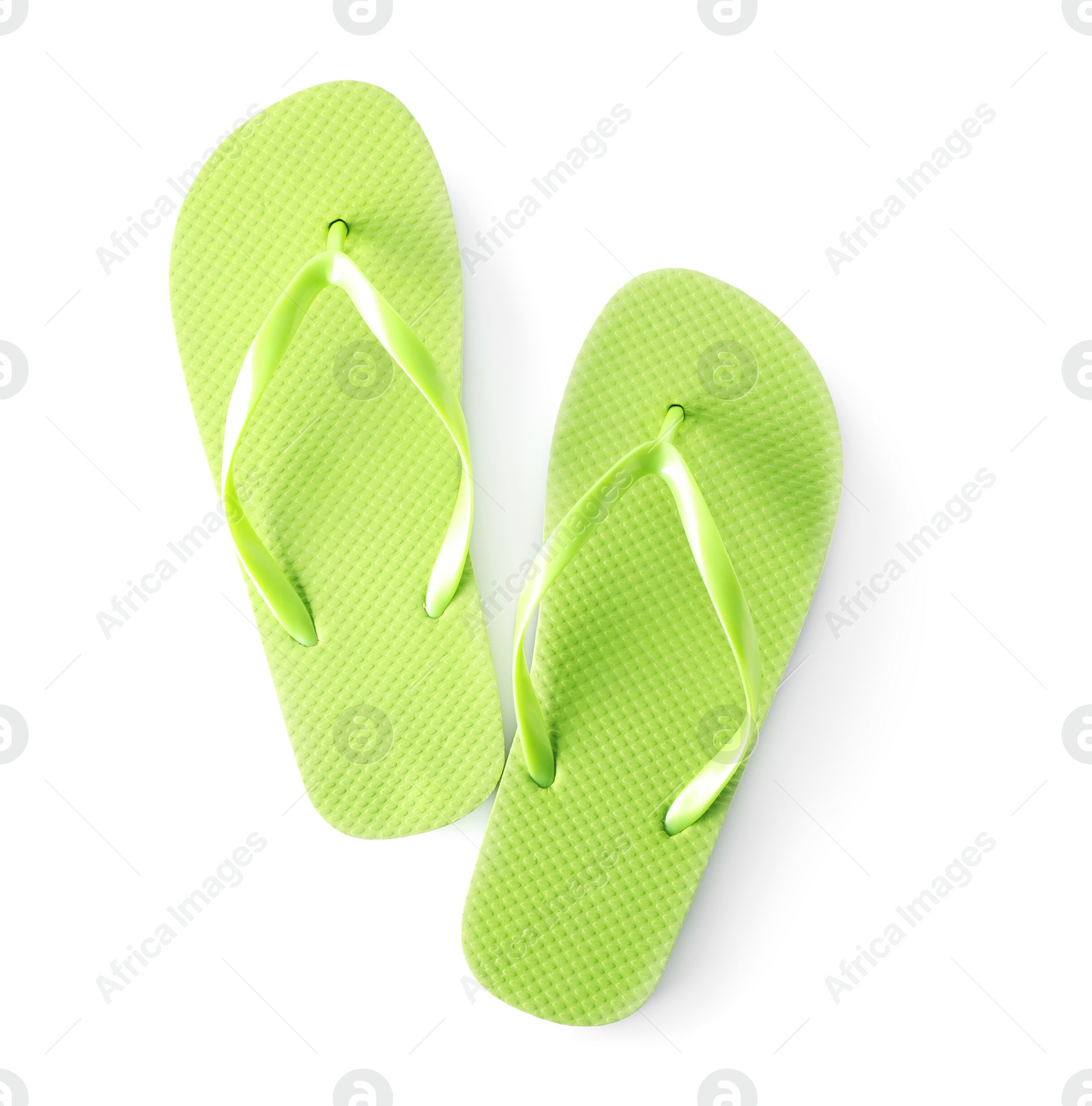 Photo of Bright flip flops on white background. Beach object