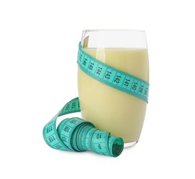 Tasty shake and measuring tape isolated on white. Weight loss