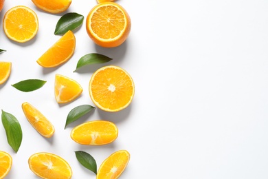 Photo of Composition with ripe oranges on white background, top view