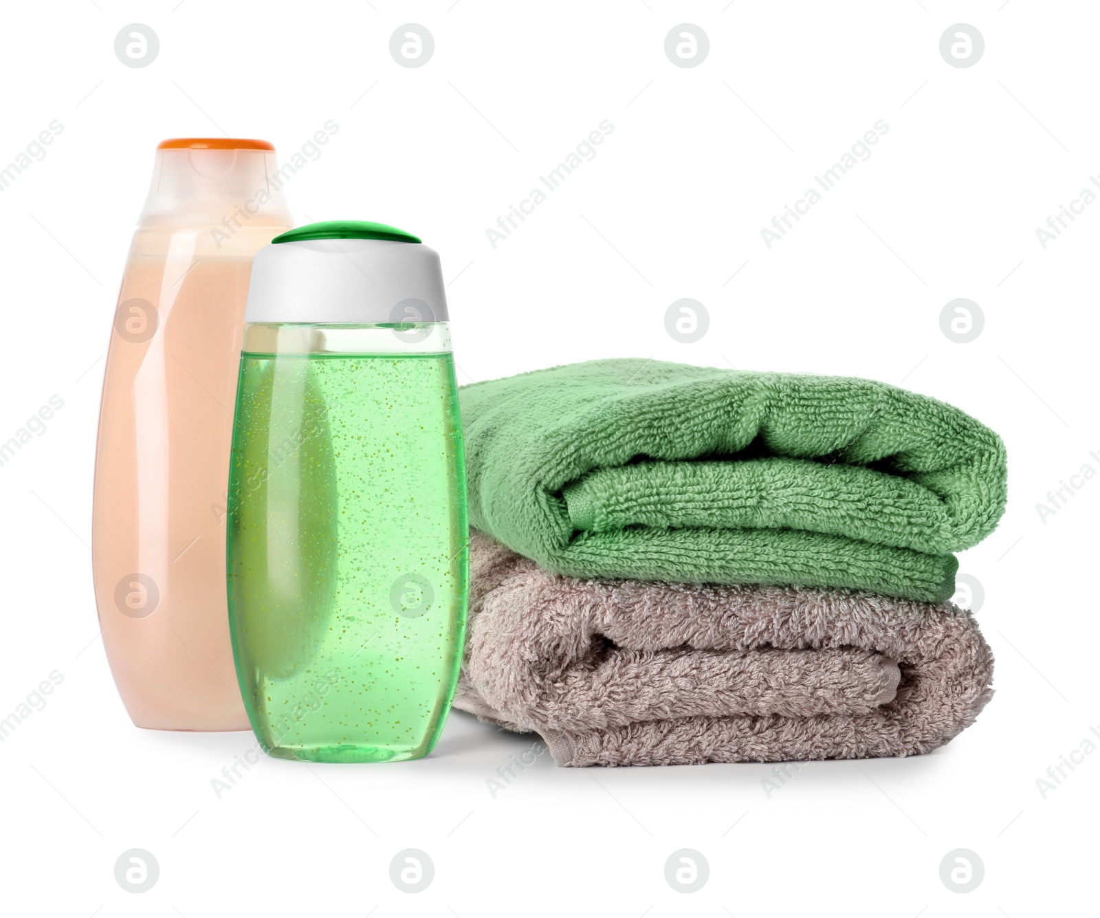 Photo of Personal hygiene products and towels on white background