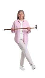 Senior woman with walking cane on white background