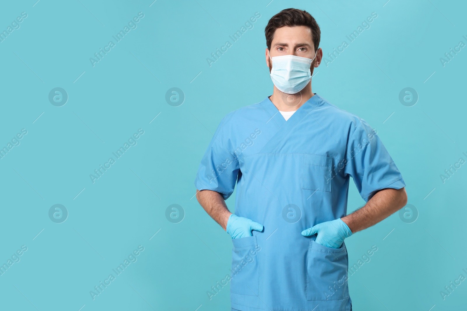 Photo of Nurse with medical mask on light blue background, space for text